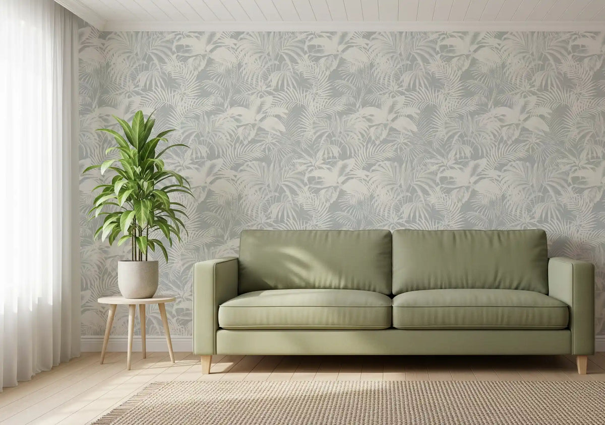 Monochrome tropical palm wallpaper behind a sage green leather loveseat GD12704