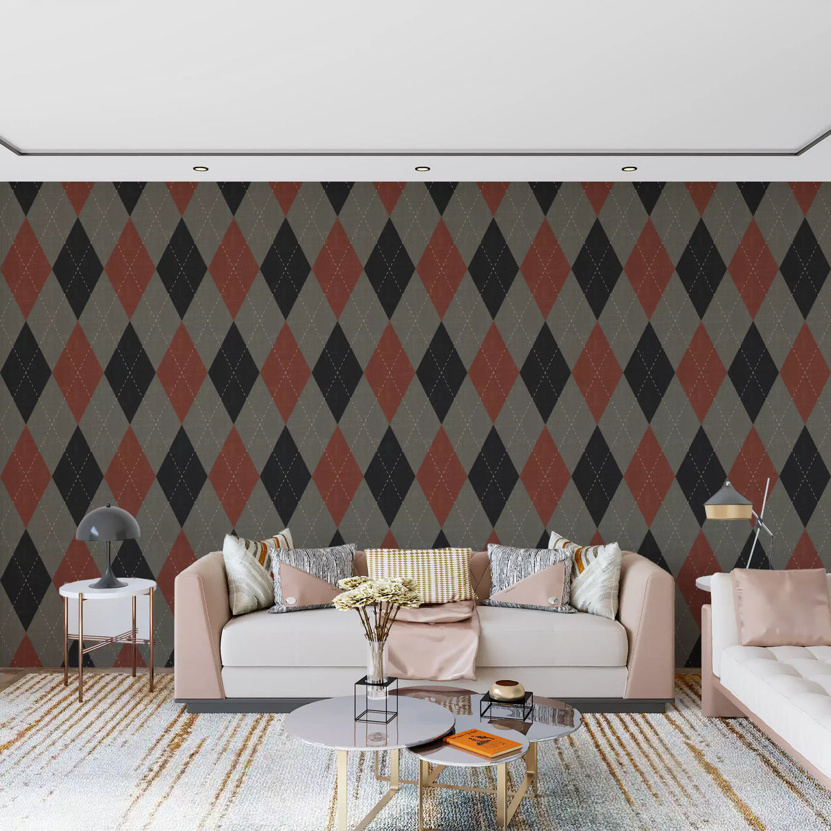 Charcoal, grey and rust argyle harlequin wallpaper behind a blush pink sofa GD12718
