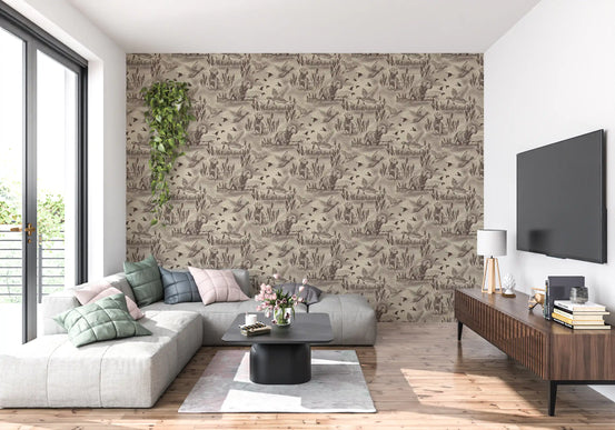 Wildlife toile wallpaper behind a grey sectional and TV console in a bright living room GD12742
