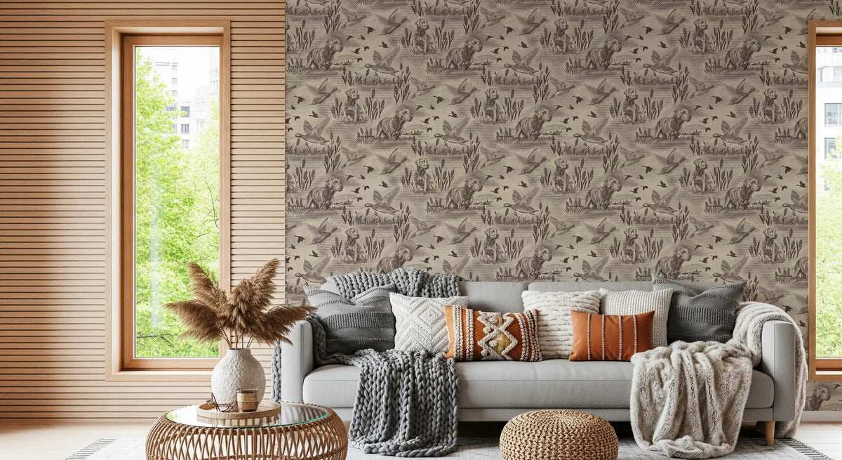 Wildlife toile wallpaper behind a grey sofa with throws and pampas grass GD12742