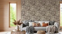 Wildlife toile wallpaper behind a grey sofa with throws and pampas grass GD12742