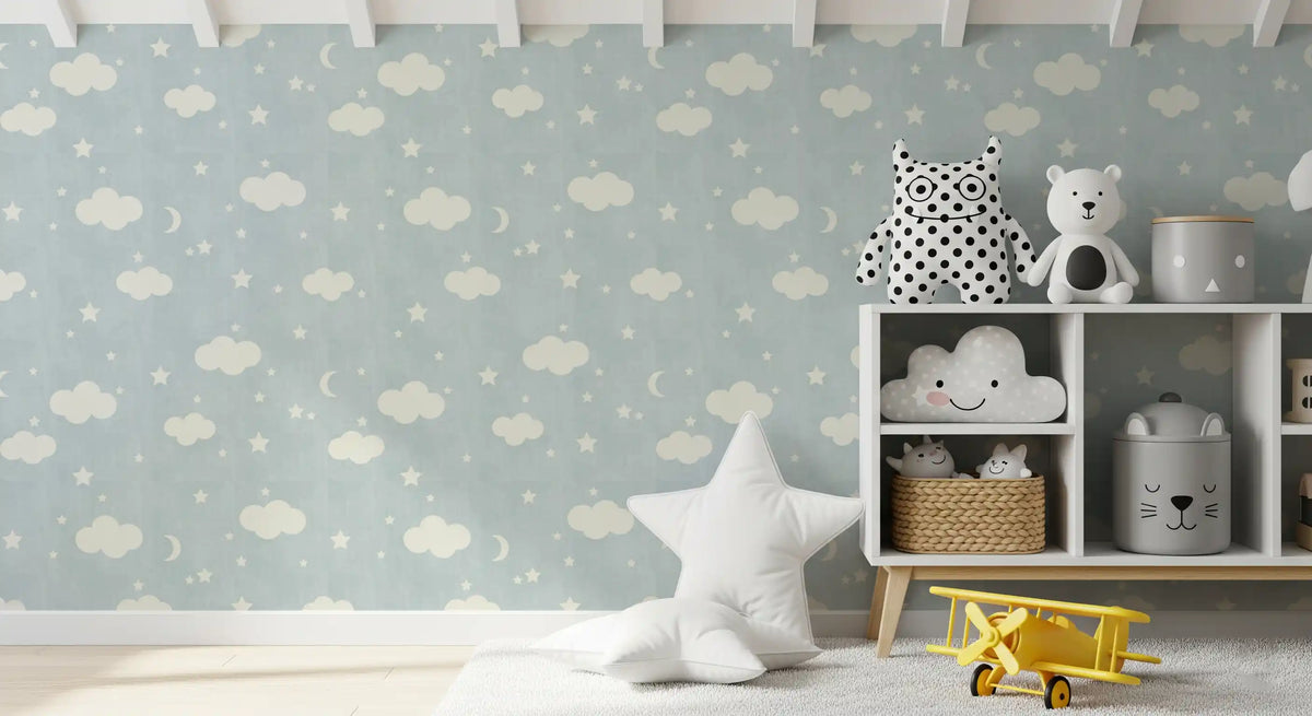 Sweet Dreams cloud nursery wallpaper behind a white cube shelf with plush bear toys GD12753
