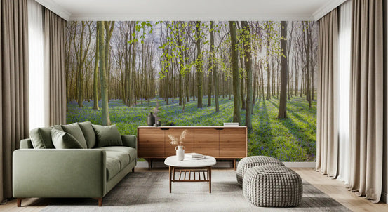 Bluebell woodland forest mural behind a sage green sofa and wood sideboard GD12801