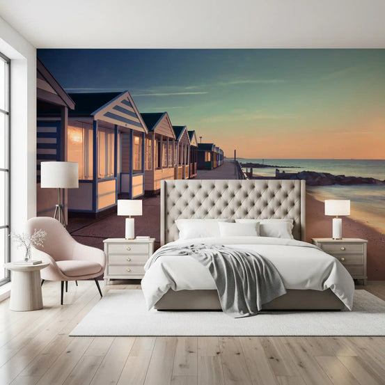 Sunrise Promenade View wall mural behind an upholstered bed and pink accent chair GD12815