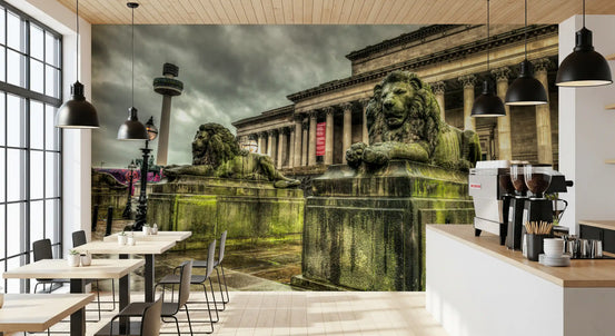 Historic Stone Guardians wall mural frames a cafe counter and bistro tables GD12822