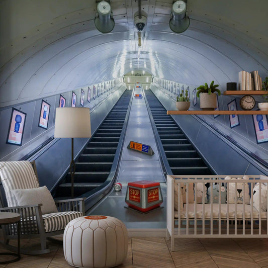 Nursery crib and striped armchair set against the industrial transit wall mural GD12830