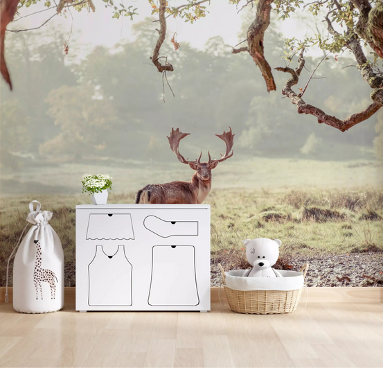 Stag Portrait wall mural glowing over a nursery with a white dresser and giraffe toy GD12832