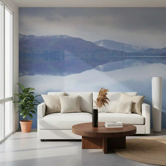 Still Water Mountain Vista wall mural behind a white sofa and round wood table GD12833