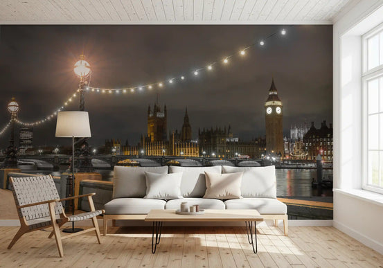 White sofa and wooden chair beneath the Thames Riverfront Twilight wall mural at night GD12841