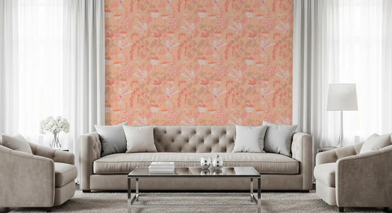 Hummingbird and fuchsia wallpaper behind a grey tufted sofa and glass table GD12851