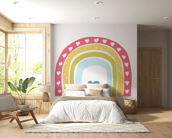 Boho hearts rainbow motif wall mural above a white bed in a sunny bedroom GD12897
