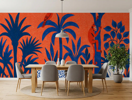 Bold orange and blue jungle wildlife wall mural behind a wood dining table with grey chairs GD12926