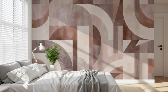 Geometric terracotta arches wall mural behind a white bed with a grey blanket GD12930