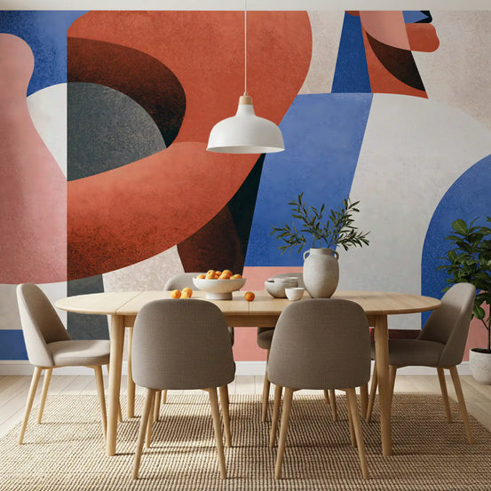 Modern geometric abstraction wall mural behind a wooden dining table with tan chairs GD12931