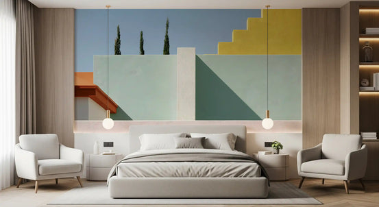 Mediterranean geometric facade wall mural behind a grey bed with two white armchairs GD12937