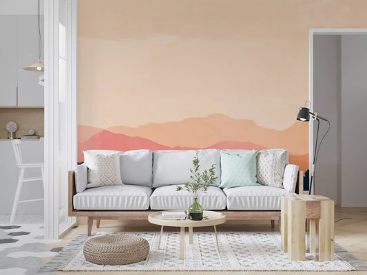 Pink sunset mountain mural above a white sofa with mint pillows in a bright living room GD12961