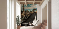 Brooklyn Bridge mural in a hallway beside stairs and a potted plant GD13034