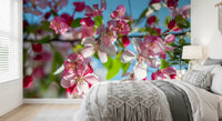Pink blossom mural in a bedroom with grey macrame bedding GD13035