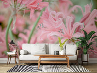 Pink lily floral mural in a living room with a white sofa and striped rug GD13036