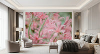 Floral wallpaper in a bedroom with a soft beige bed and armchair GD13036