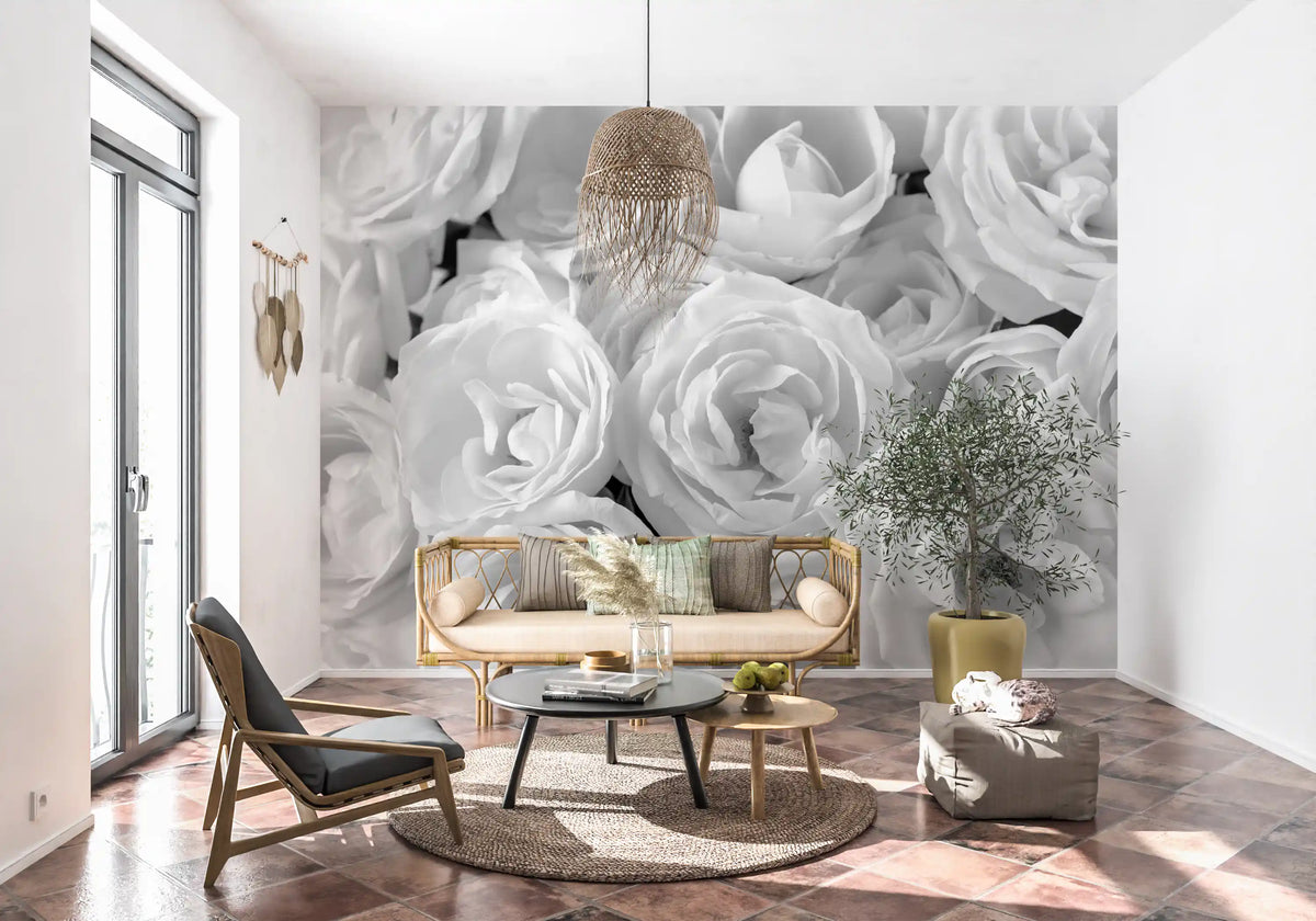 Monochrome rose wallpaper in a sunlit corner with rattan seating GD13038