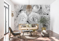 Monochrome rose wallpaper in a sunlit corner with rattan seating GD13038