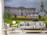 Spring garden mural behind a grey sofa and armchair in a living room GD13041