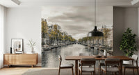 Dutch canal mural behind a wooden dining table and chairs GD13043