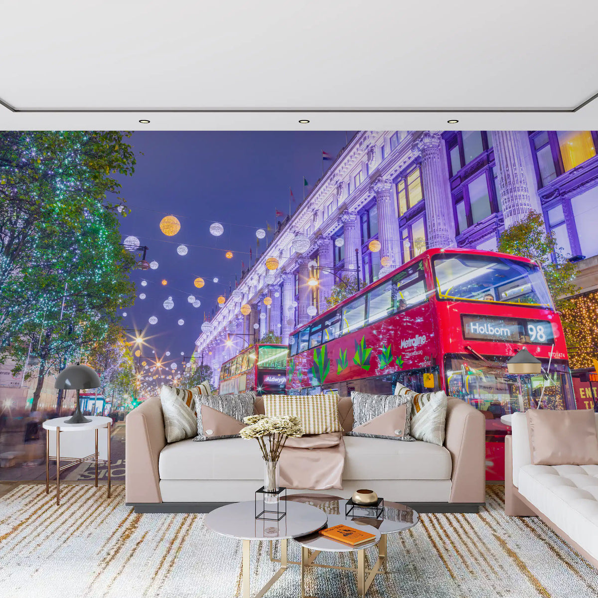 Living room sofa below the red bus and festive London street mural GD13045
