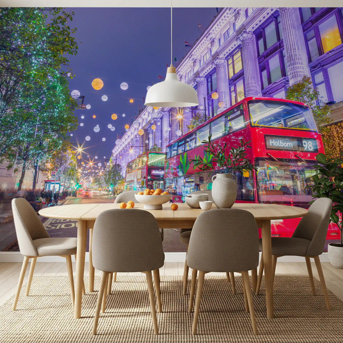 Oval dining table in front of the festive London street night mural GD13045