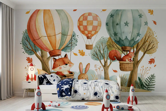 Woodland wallpaper in a boys nursery with rocket toys and a starry balloon mural GD13114
