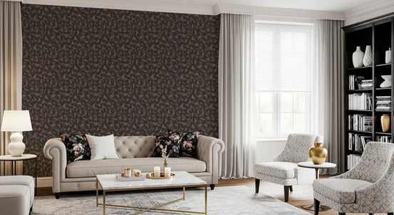 Geometric wallpaper behind a tufted beige sofa, gray armchairs and black bookshelf GD13581