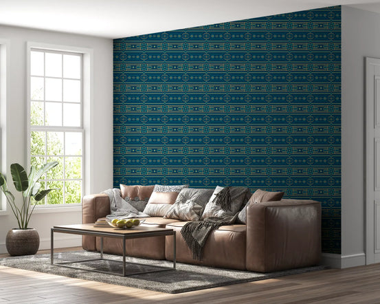 Blue wallpaper behind a brown leather sofa, metal coffee table and gray rug GD13586