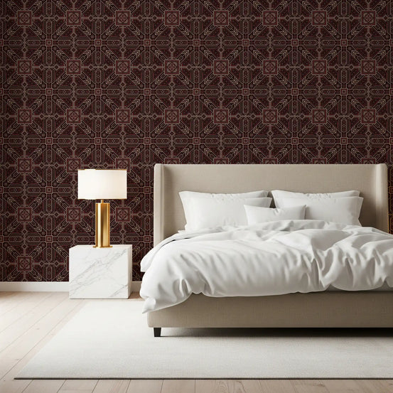 Bedroom with a beige upholstered bed and brass lamp against burgundy geometric wallpaper GD13591