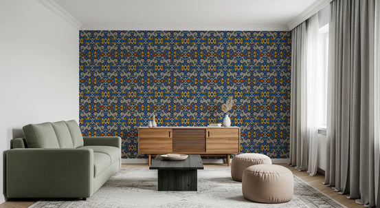 Tile wallpaper in blue and saffron behind a sage green sofa and wooden sideboard GD13613