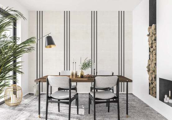 Striped wallpaper in a dining room with black chairs and a log store GD13909