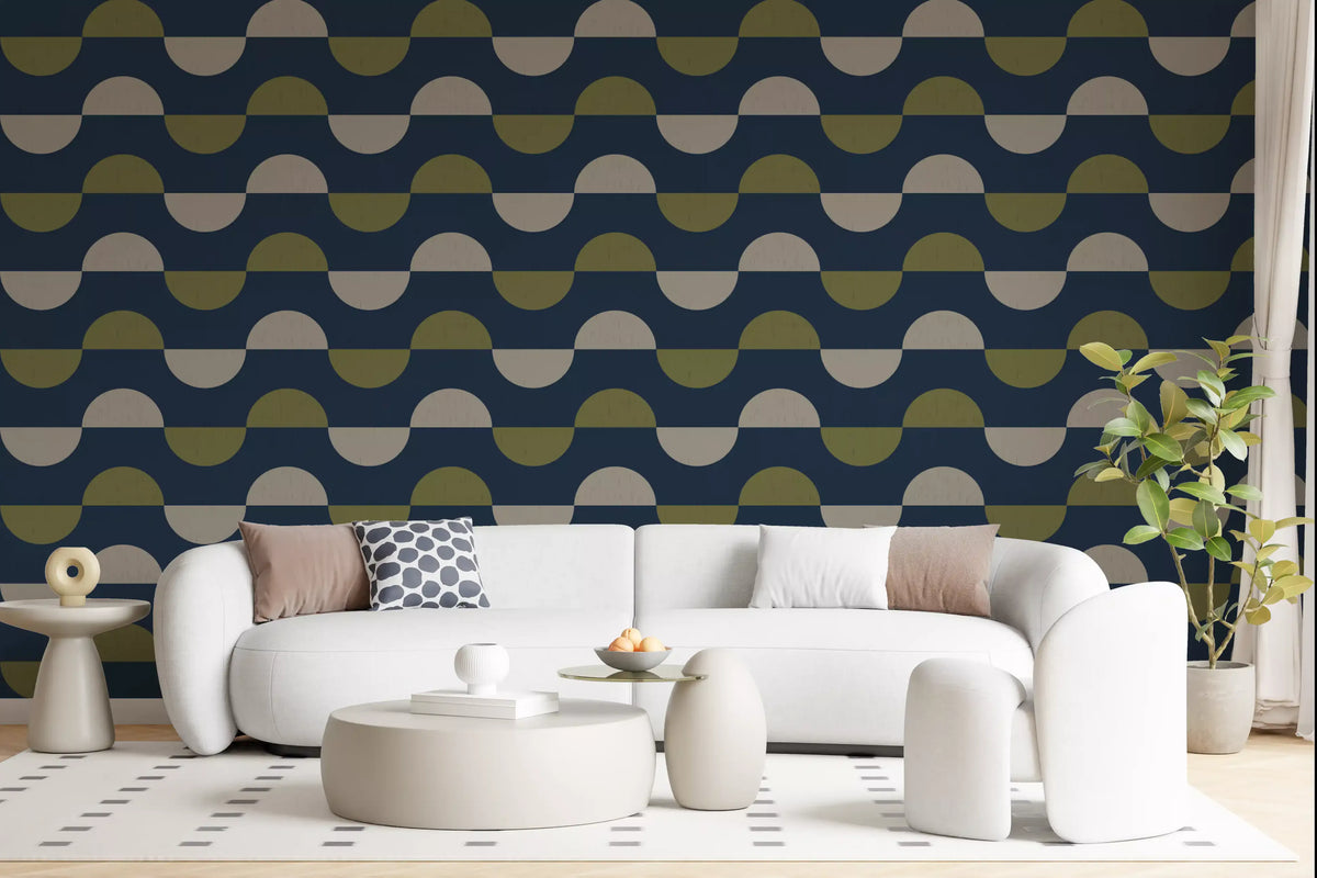 Mid-century wallpaper behind a curved white sofa and round pouf coffee table GD13940