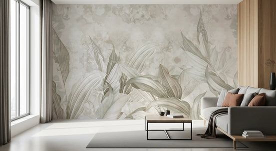Muted botanical wallpaper behind a gray sofa with rust cushions and wood panels GD13963