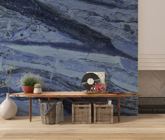 Wood console table with record player and wicker baskets on blue marble wallpaper GD13999