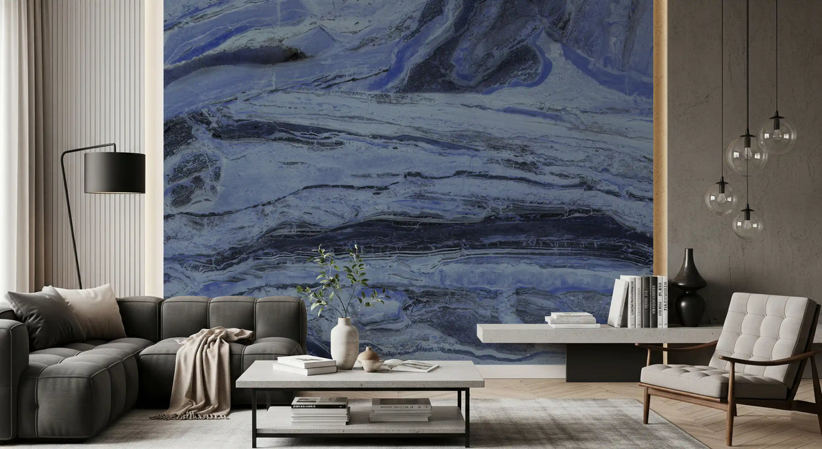 Dark gray sofa and mid century armchair against indigo swirl marble wallpaper GD14001