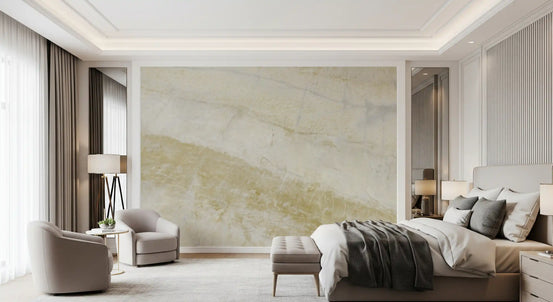 Bedroom with gray bed, dark throw and armchairs against cream and sand marble wallpaper GD14047