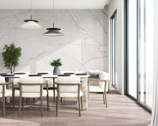 Dining room with long table, cream chairs and black pendants by blush marble wallpaper GD14069