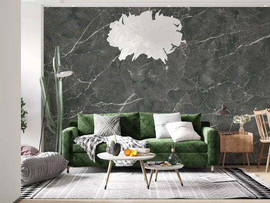 Charcoal marble wallpaper mural behind green velvet sofa and round coffee tables GD14086