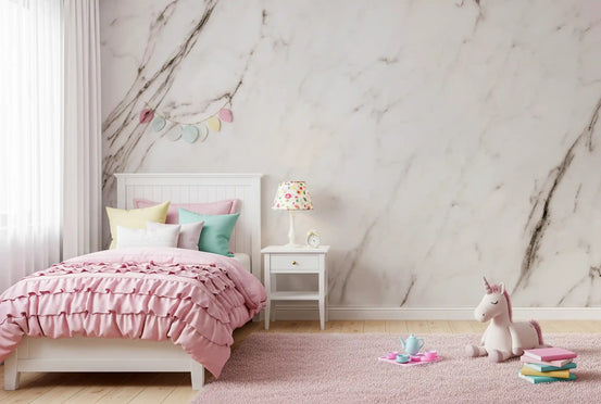 Cream marble wallpaper in a girls bedroom with pink ruffled bed and unicorn toy GD14106