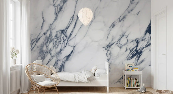 Navy veined white marble wallpaper in a kids room with rattan chair, daybed and bookshelf GD14120