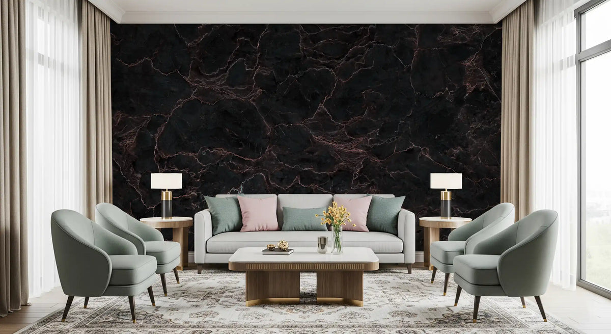 Living room with pale gray sofa, sage curved armchairs and brass lamps on black marble wallpaper GD14135