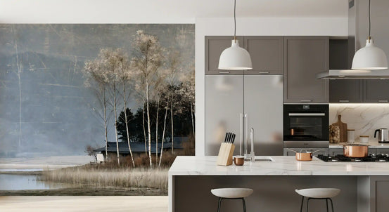 Birch tree wallpaper beside a modern kitchen island with white pendants and gray bar stools GD14151