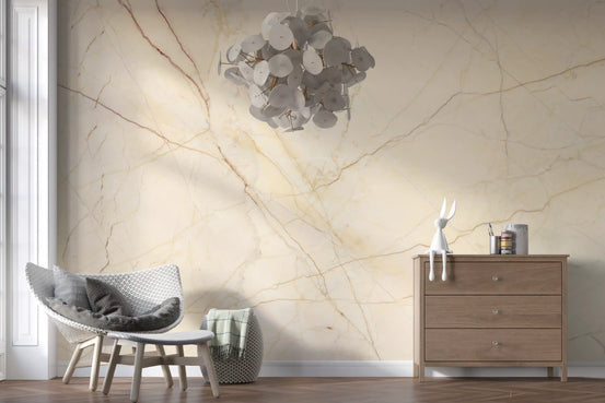 Cream marble wallpaper in a reading corner with a gray lounge chair and a walnut dresser GD14152