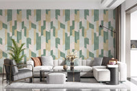 White sofa, gray armchair and potted palm in front of geometric wallpaper GD14169