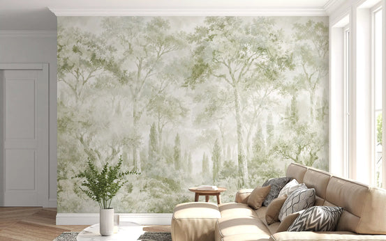Forest wallpaper behind a beige leather sofa with chevron cushions and olive tree GD14179